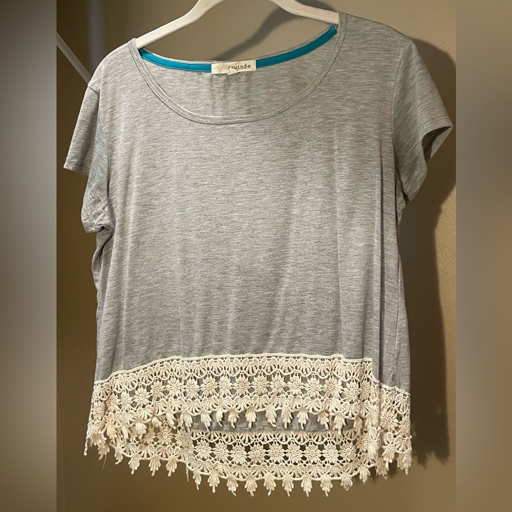 Slightly cropped tee with lace detail, size small.
